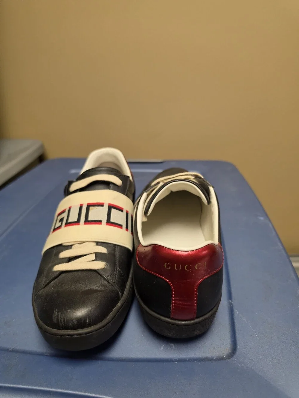 Gucci Men’s Black Leather New Ace Sneakers with Red Heel and Beige Branded Strap